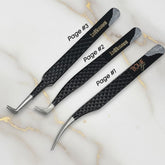 Daboujiebar Lash Testament tweezers: straight, 45-degree angled, and curved tips. Black textured handles with Bible page tear design.