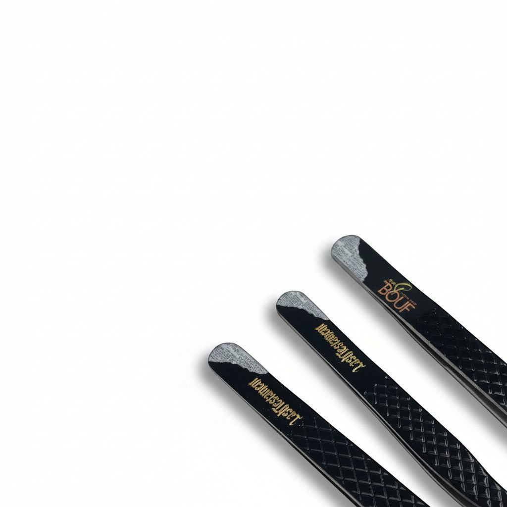 Daboujiebar Lash Testament black fiber grip tweezers with gold lettering and a Bible page tear design. Ideal for lash application.