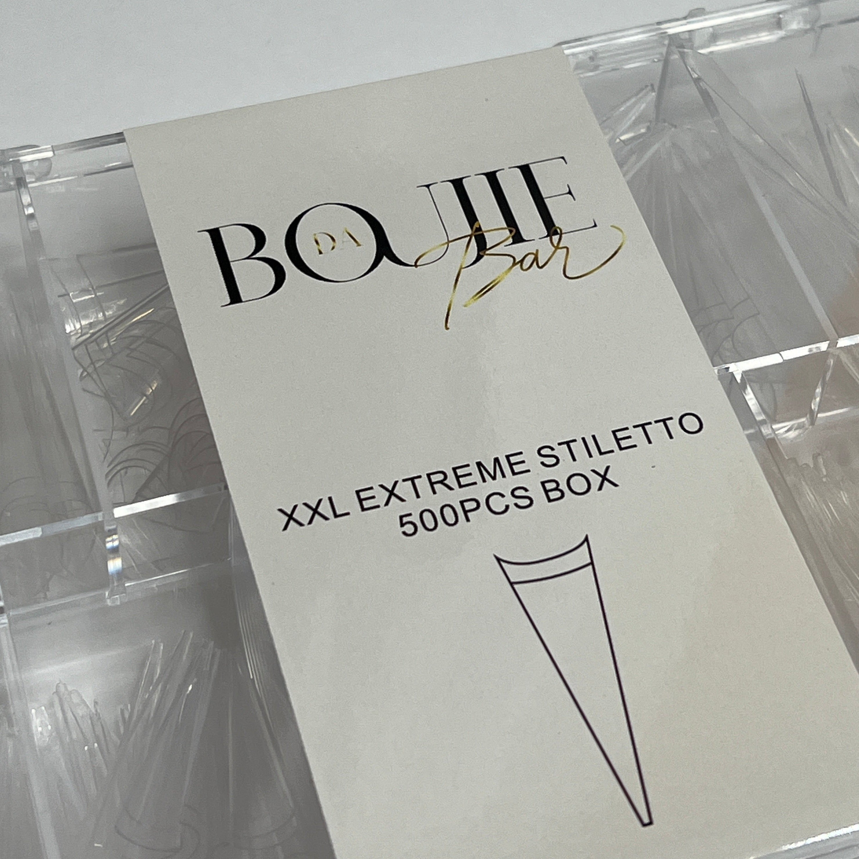 Daboujiebar XXL Extreme Stiletto nail tips in a clear plastic case, 500 pieces.